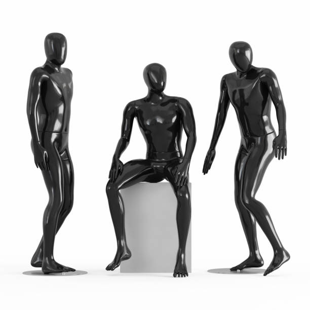 istock Three black mannequins two stand, one sits. Black and white plastic 3D 1169981935