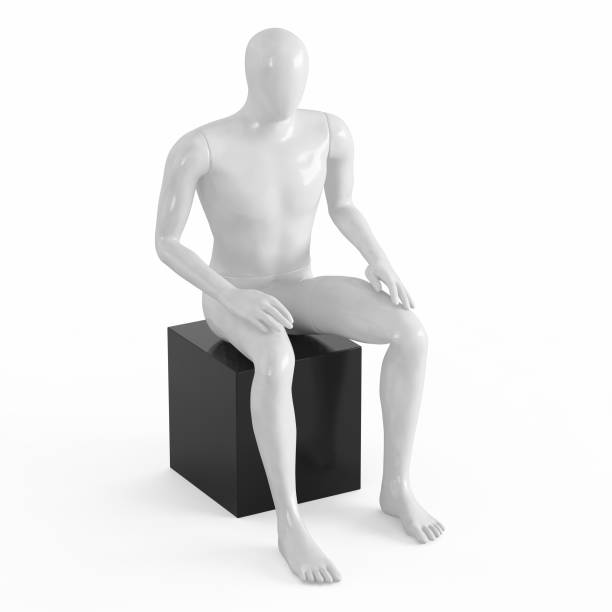 istock A white faceless mannequin sits on a black box. Black and white plastic 3D 1169981946