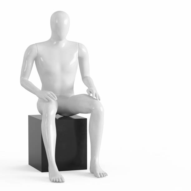istock A white faceless mannequin sits on a black box. Black and white plastic 3D 1169981949