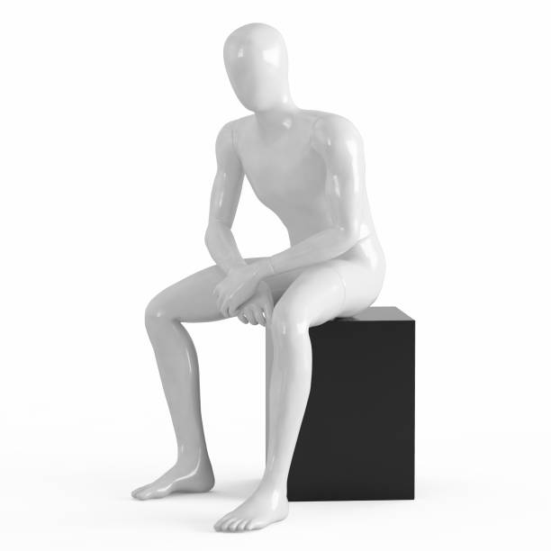 istock A white faceless mannequin sits on a black box. Black and white plastic 3D 1169981970