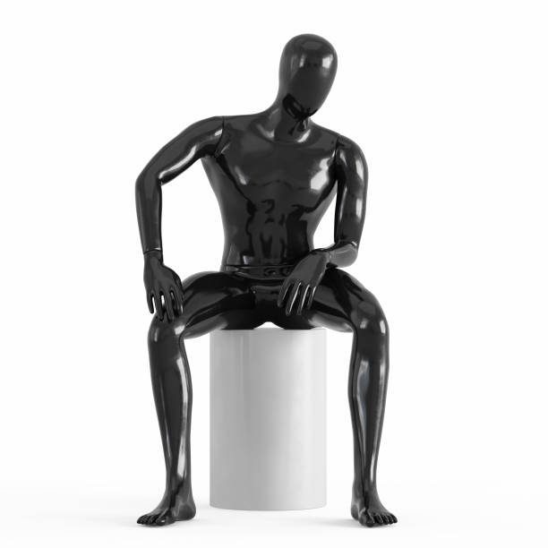 istock A black faceless mannequin sits on a white top hat. Black and white plastic 3D 1169983218