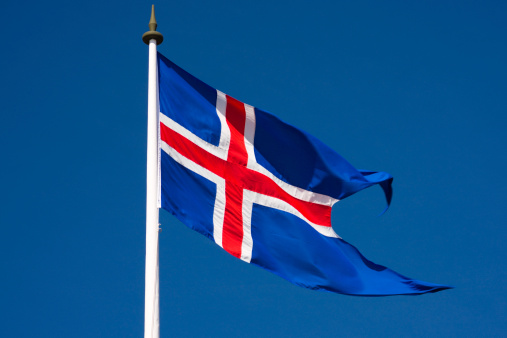The icelandic flag with blue sky.