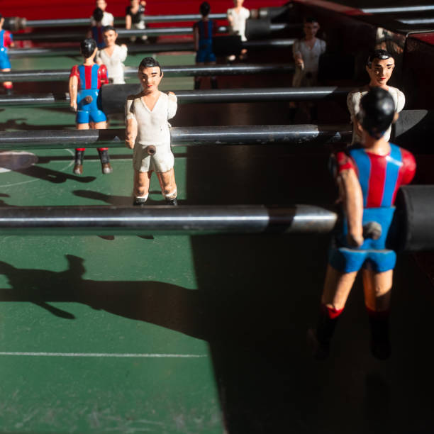 istock Close-up of an old foosball table. 1169989389