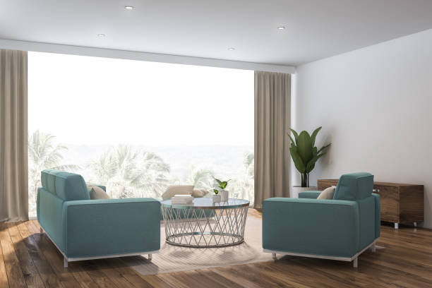 istock White living room corner, blue sofa 1169998899