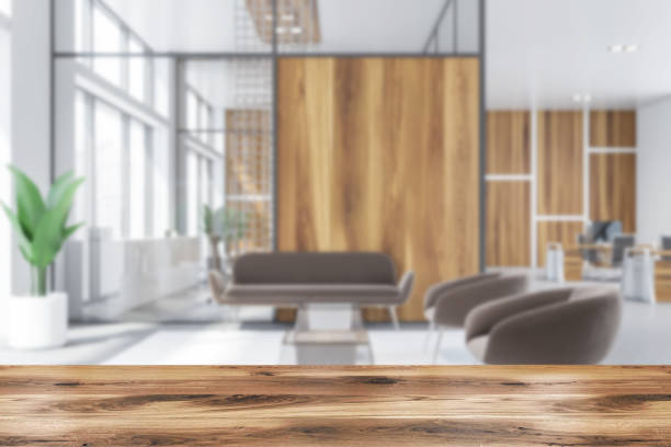 istock Blurred wooden office waiting room interior 1169999758