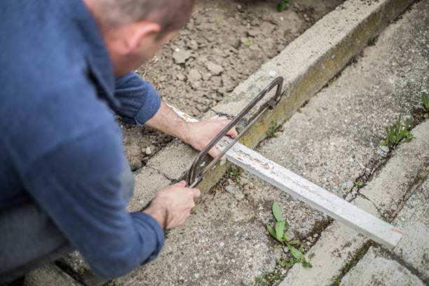istock The master repairs the door 1170000960
