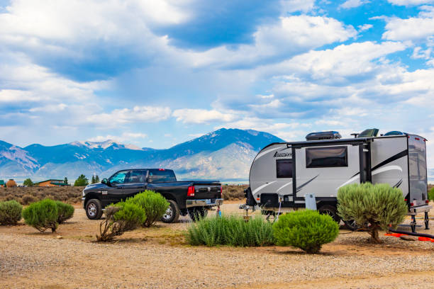 Truck and RV trailer camped in southwest by RV shipping company