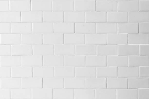 istock Porcelain tile texture patterned wall background white cream beige grey color 1170007475