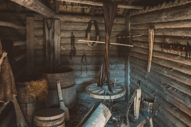 istock Interior of vintage leather workshop. Leather crafting tools on wooden wall. 1170008907