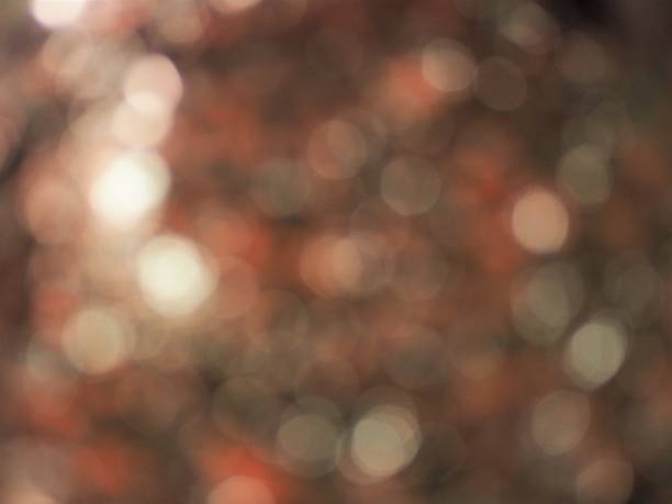 istock Sparkling red and white bokeh over black background. Romantic winter and christmas night concept. 1170010368