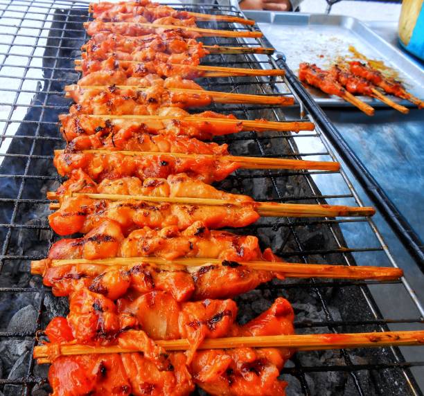 istock Grilled chicken on a steel grill 1170011480