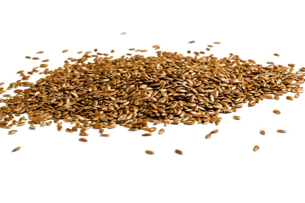istock Heap of linseeds, flax seeds on white background. 1170012098