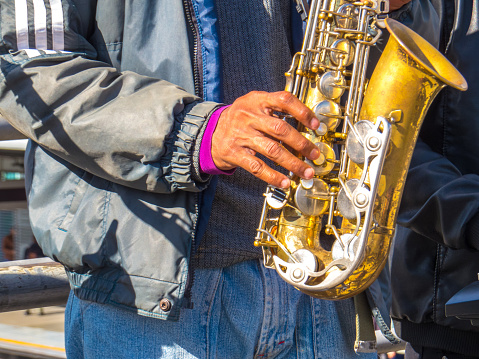 Man playing saxophone in the street