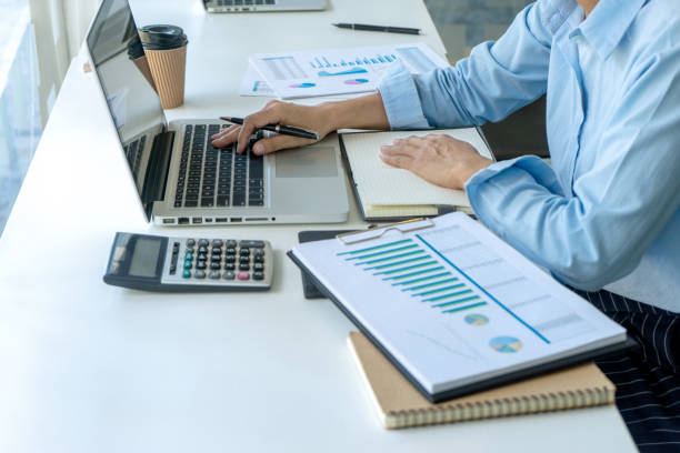 istock businessman in meeting analysis chart graphy 1170018667