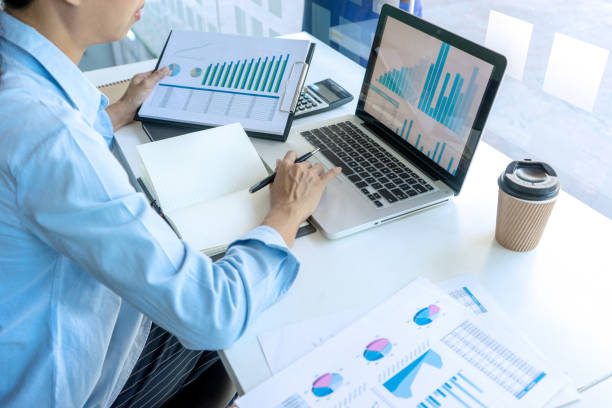 istock businessman in meeting analysis chart graphy 1170018674