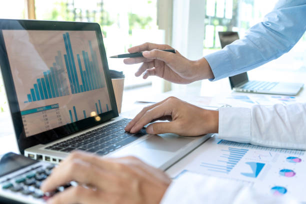 istock businessman in meeting analysis chart graphy 1170018679