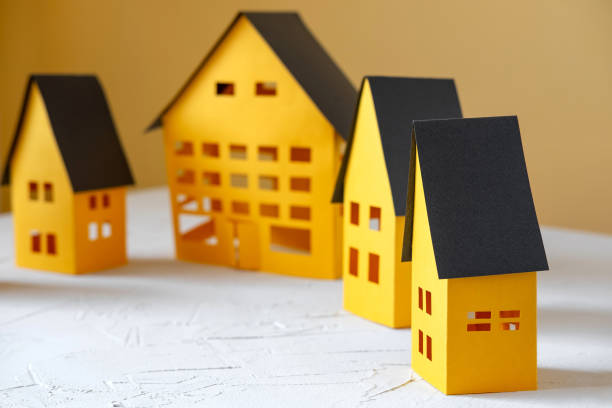 istock Paper City cut from a yellow paper. 1170018847