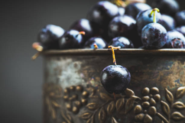 istock Freshly harvested blueberries in metal cup 1170022003