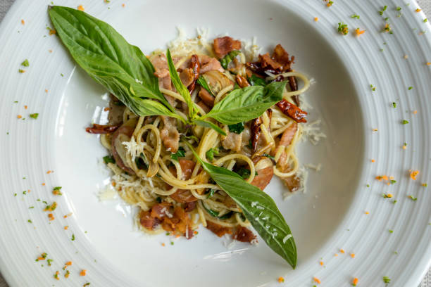 istock spaghetti with beacon and cheese in white dish for dinner 1170022118