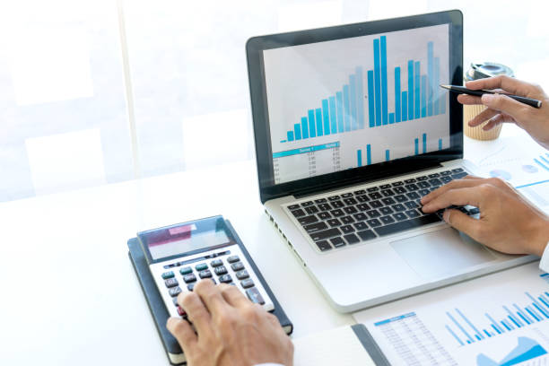 istock businessman in meeting analysis chart graphy 1170022218