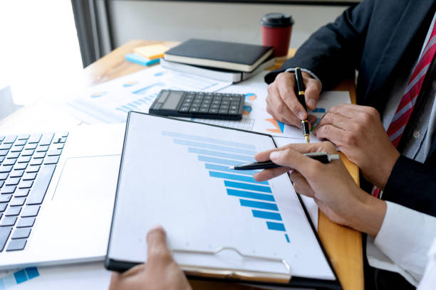 istock Businessman coaching office staff 1170022259