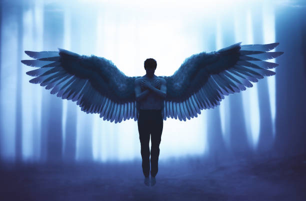 istock An angel in mystic forest,3d illustration 1170024460