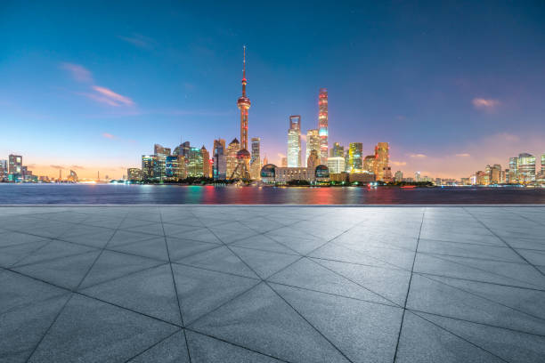 istock Empty floor and modern city scenery at night in Shanghai,China. 1170026030