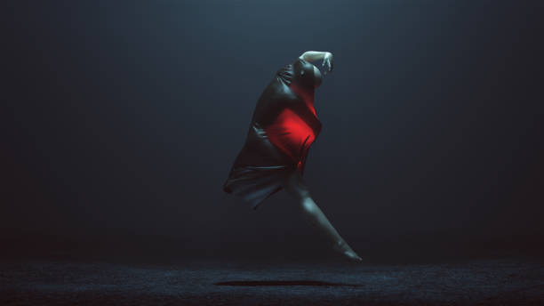 istock Black Ballet Dancer Demon Leaping Through the Air Wrapped in a Black Transparent Plastic with a Glowing Red Light Futuristic Right View 1170038751