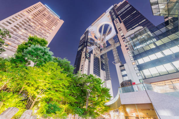 istock Osaka skyline and architecture at night, skyward view 1170039950