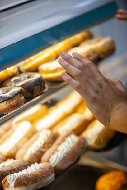 istock Caucasian man buying donuts 1170042200