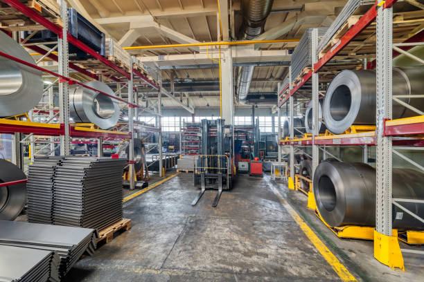istock Tiered rack with sheet metal rolls. Internal warehouse of raw materials 1170043008