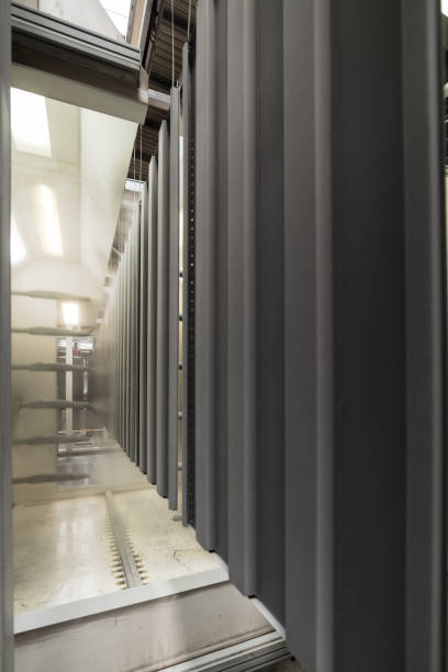 istock Powder coating line. Camera painting products in an electrostatic field 1170043086