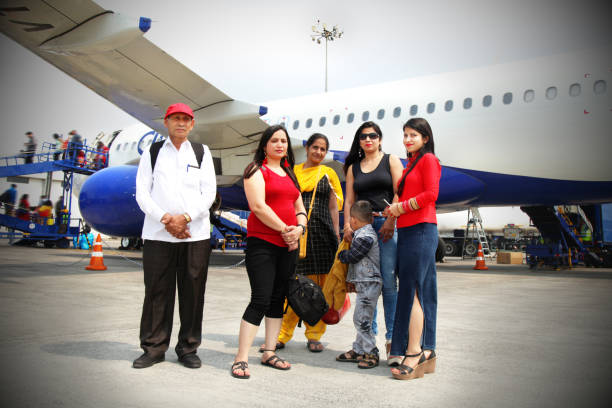 istock Family standing at Airport 1170043193