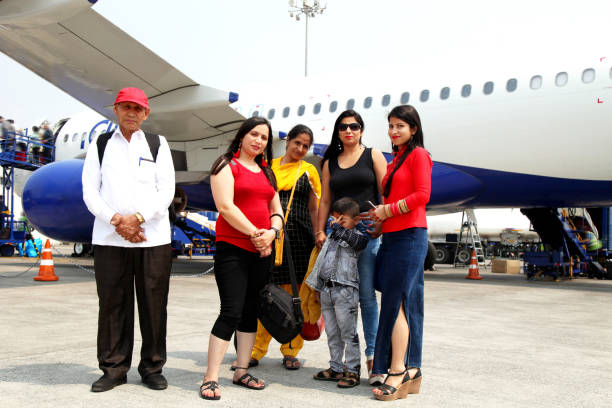 istock Family standing at Airport 1170043205