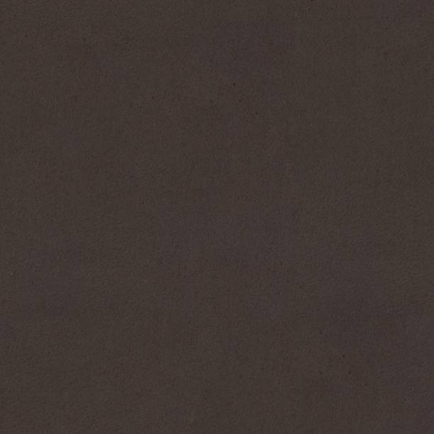 istock Leather texture of brown color. Seamless square background, tile 1170044149
