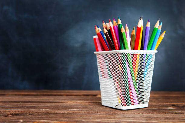 istock Back to school concept with school supplies on blackboard background with copy space 1170045564