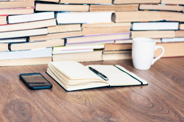 istock education concept background, many books piles with copy space for text 1170047769