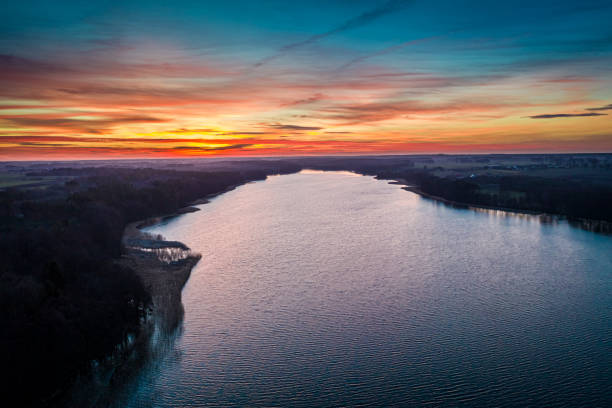 istock Flying above on lake at dusk in winter, Poland 1170050923