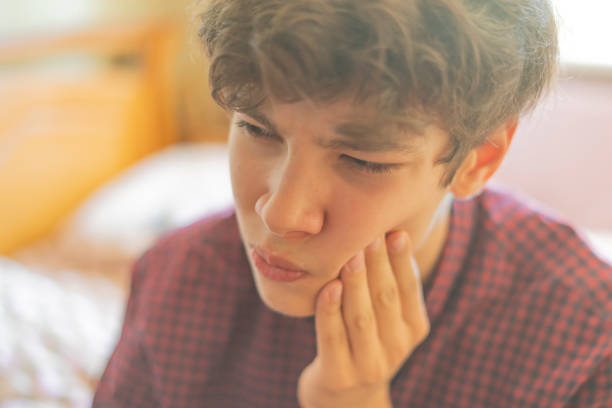 istock close up male head suffer from toothache f 1170051149
