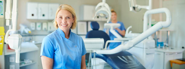 istock female dentist portrait 1170062440
