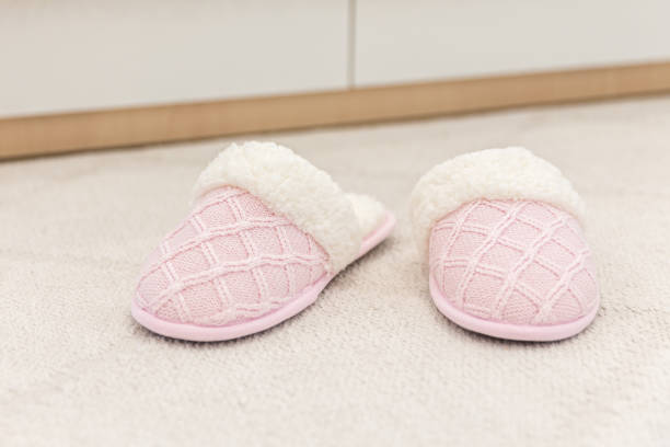 istock Woman house slipper on floor carpet slippers 1170068964