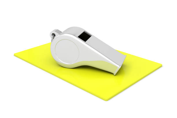 istock whistle card yellow referee football judge 1170073030