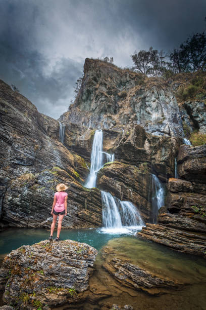 istock Traveler exploring waterfalls of remote mountain wilderness 1170073606