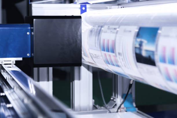 istock new innovative digital technology of automatic printing machine is printing on continuous in the printing factory. 1170073787