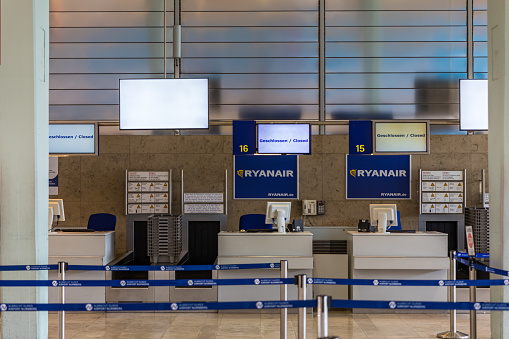 Nuremberg, Germany - May 6, 2018: Empty Check-in Ryanair counter at Nuremberg Airport. Nuremberg airport is located in Germany.