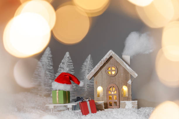 istock Christmas card with house in snow 1170077449