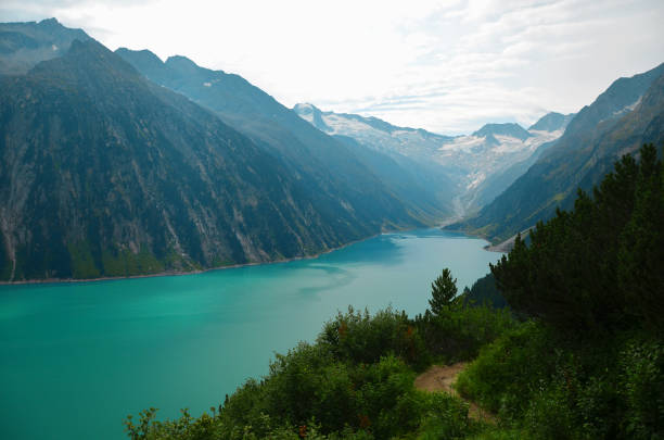 Zillertal Alps Hike: Schlegeisspeicher (water reservoir) to Olperer Hütte Hiking the Zillertal Alps from Schlegeisspeicher (water reservoir) to Olperer Hütte (hut) with famous instagram swing bridge zillertaler alps stock pictures, royalty-free photos & images