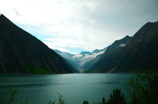 Zillertal Alps Hike: Schlegeisspeicher (water reservoir) to Olperer Hütte Hiking the Zillertal Alps from Schlegeisspeicher (water reservoir) to Olperer Hütte (hut) with famous instagram swing bridge zillertaler alps stock pictures, royalty-free photos & images