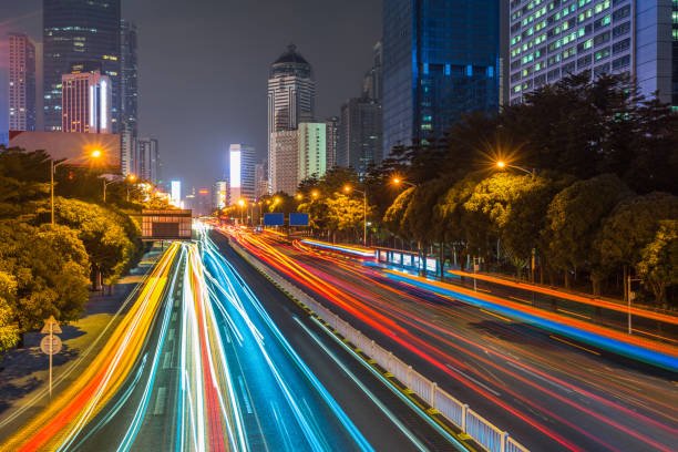 widok nocy miejskiej trajektoria tylnego światła samochodu - beijing traffic land vehicle city street zdjęcia i obrazy z banku zdjęć