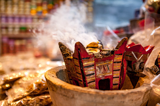 smoking frankincense at the souk in the sultanate of oman.
